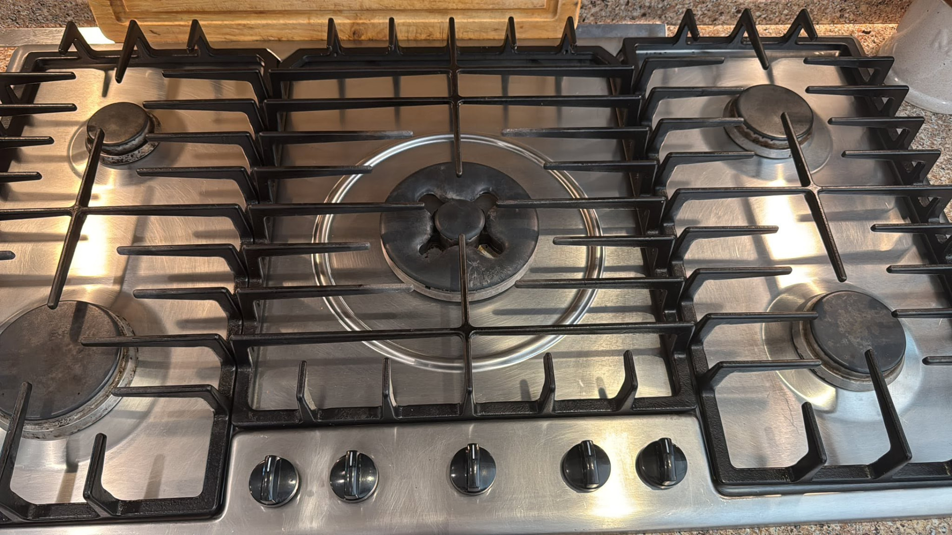 Stainless-steel cooktop after a detailed cleaning